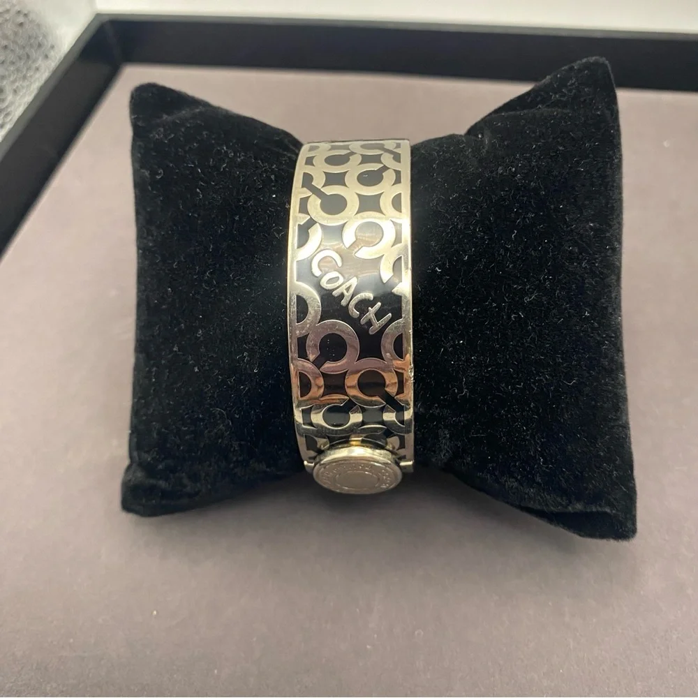 Coach Silver-Tone Black Logo Hinged Bangle Bracelet